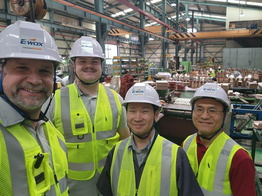 Kore Power Solutions team with manufacturing partners on the factory floor